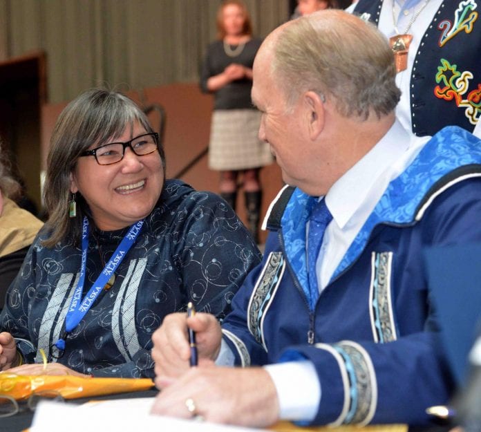 Gov. Bill Walker signs the Alaska Tribal Child Welfare Compact while Department of Health and Social Services Commissioner Valerie Davidson looks on. Photo courtesy of the office of Gov. Bill Walker