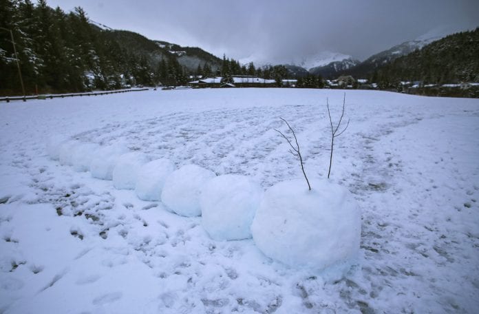 A snowman-style iceworm rests at Hollis Henrichs Park as town gets ready for the 2018 Iceworm Festival, as seen on Monday, Jan. 22, 2018. Photo by Emily Mesner/The Cordova Times