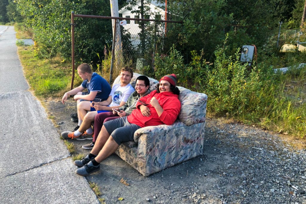 From left: Mike Glasen, Cody Shaw, Justin Lim and Brian Allison lounge around on Chase Avenue. Photo courtesy of David Glasen