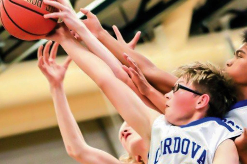 Cordova’s Vincent Nothstine, 30, and James Corales battle for a rebound in junior high basketball action against Valdez on Sept. 27, 2019. Photo courtesy Joe Prax/for The Cordova Times