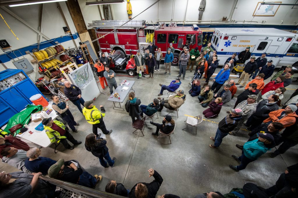Residents meet at the Cordova Fire Hall to plan the next day’s search efforts. (Oct. 10, 2019) Photo by Zachary Snowdon Smith/The Cordova Times