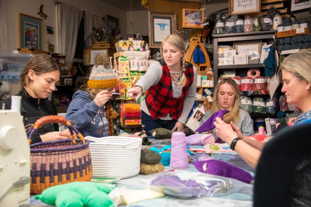 From left, Catherine Herschleb, Dariah Songer, Amber Wasson, Sidney Songer and Ann Solberg at a Waldorf doll workshop. (Nov. 17, 2019) Photo by Zachary Snowdon Smith/The Cordova Times